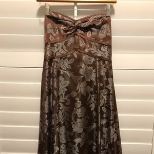 Harold’s strapless brown and silver dress